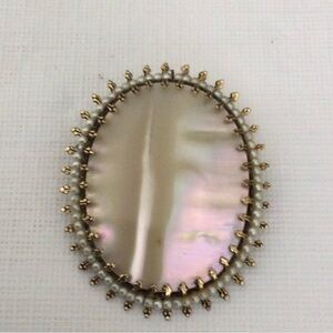 Woman’s Vintage Abalone Shell Brooch with pearls can also be worn on a chain.